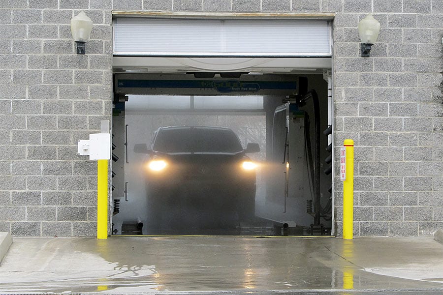 SUV going through car wash