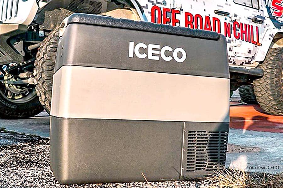 Iceco portable camping fridge on ground