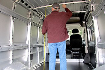 Man standing inside van