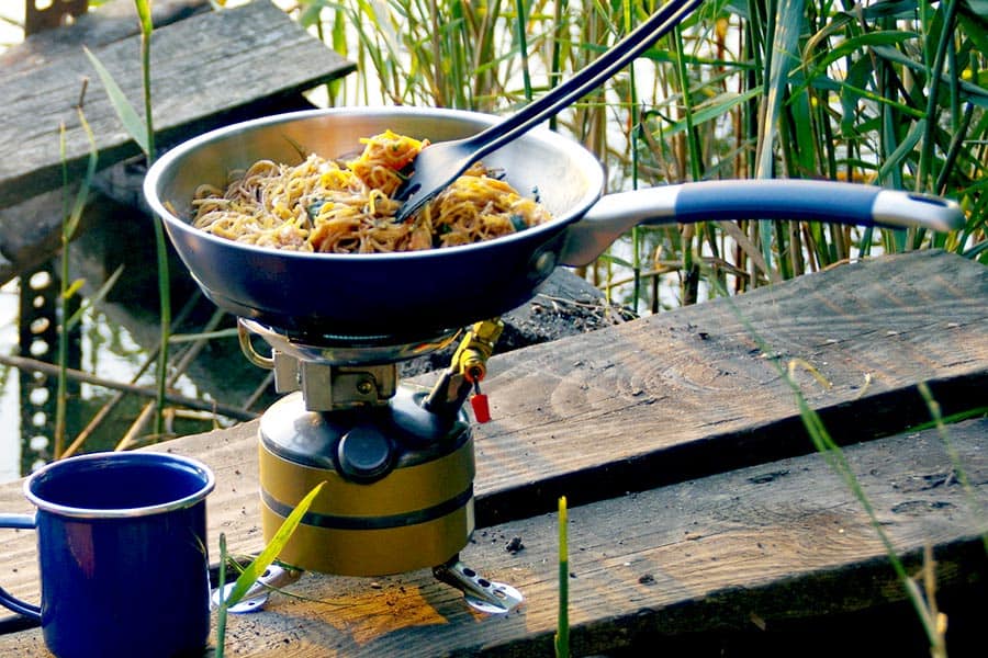 Cooking pasta over camp stove