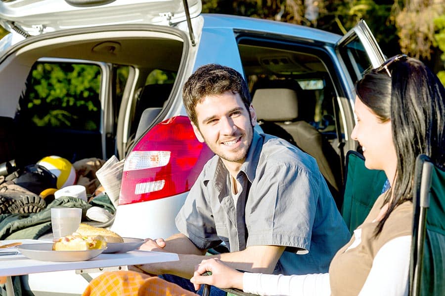 Couple eating lunch at campground