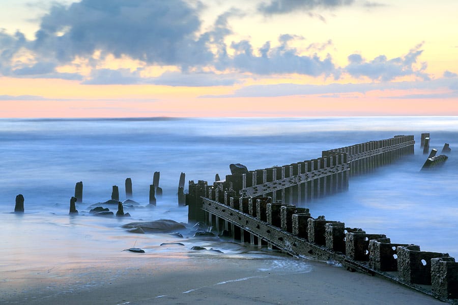 OBX seashore with orange colored sky