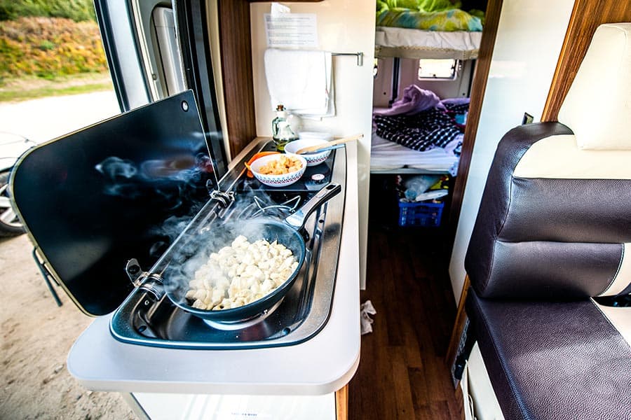 Food cooking on RV kitchen stove