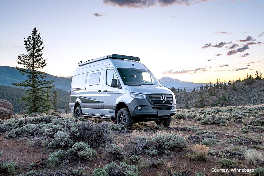 Winnebago Revel camper van in alpine meadow