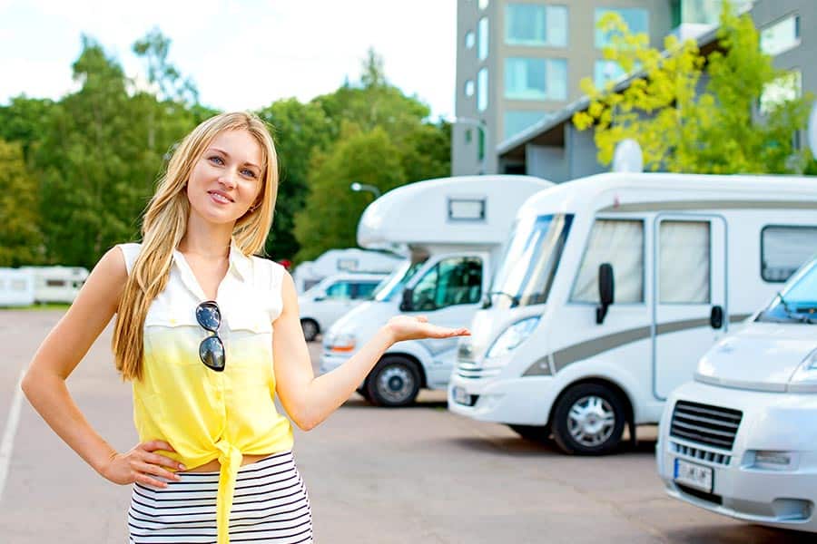 Woman looking at motorhomes to rent