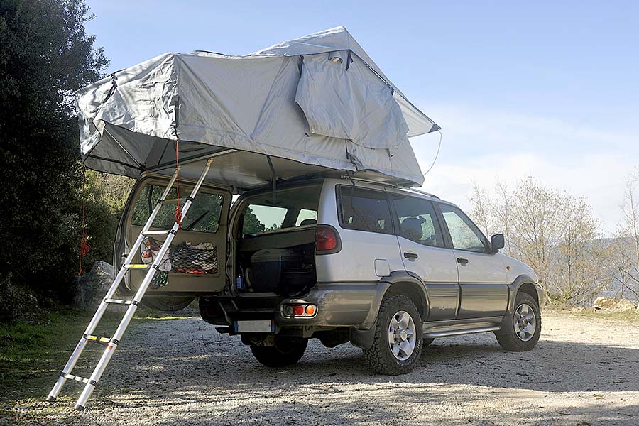 SUV with rooftop tent setup