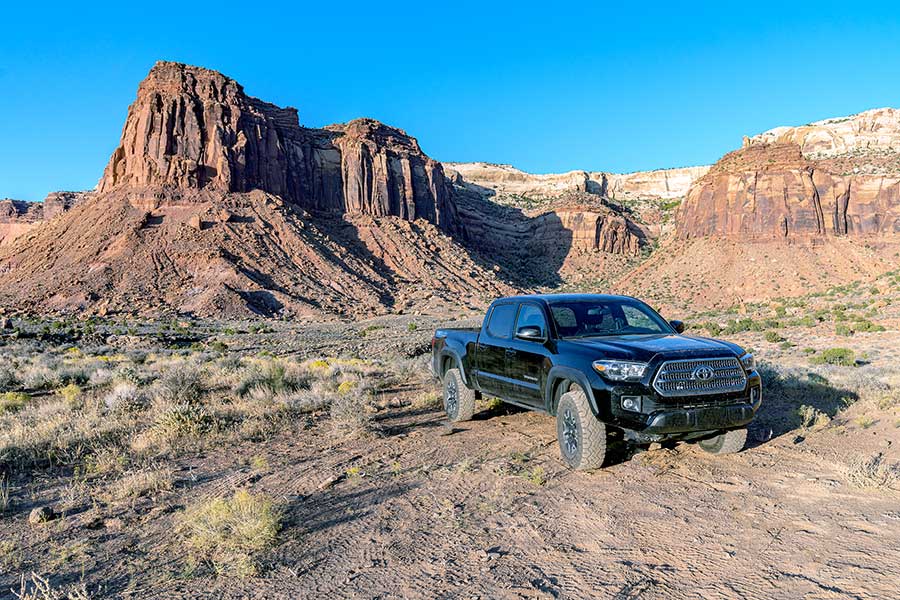 Tacoma parked in canyon landscape