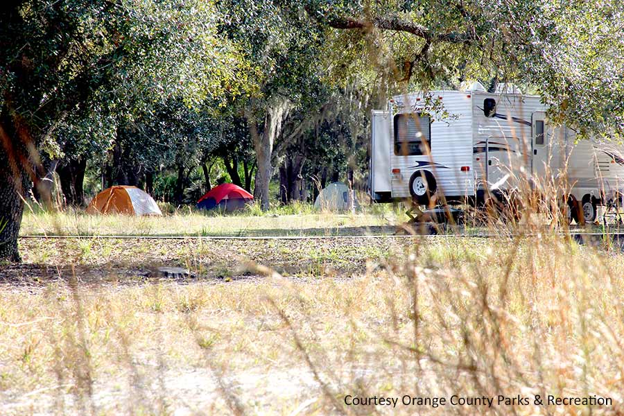 Tents and camper at Moss Park, Florida