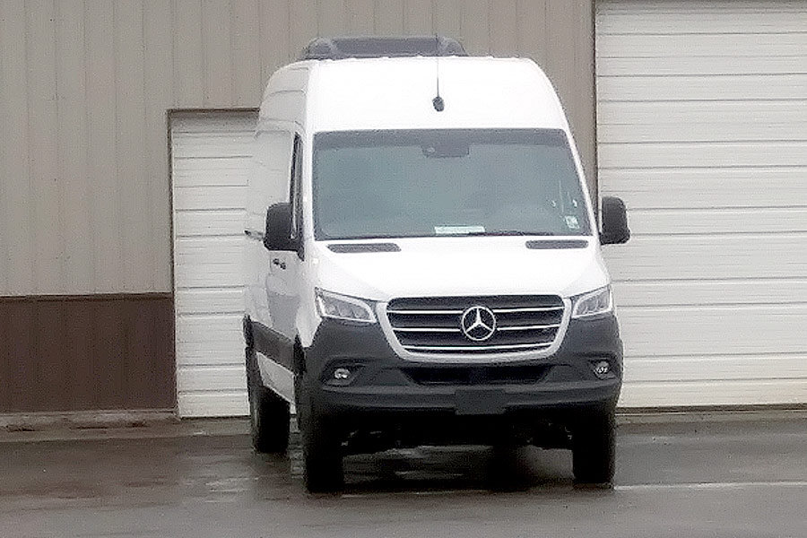 White Mercedes-Benz-Sprinter van