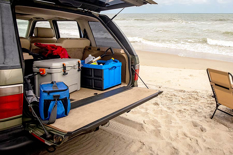 Coolers in back on SUV at the beach