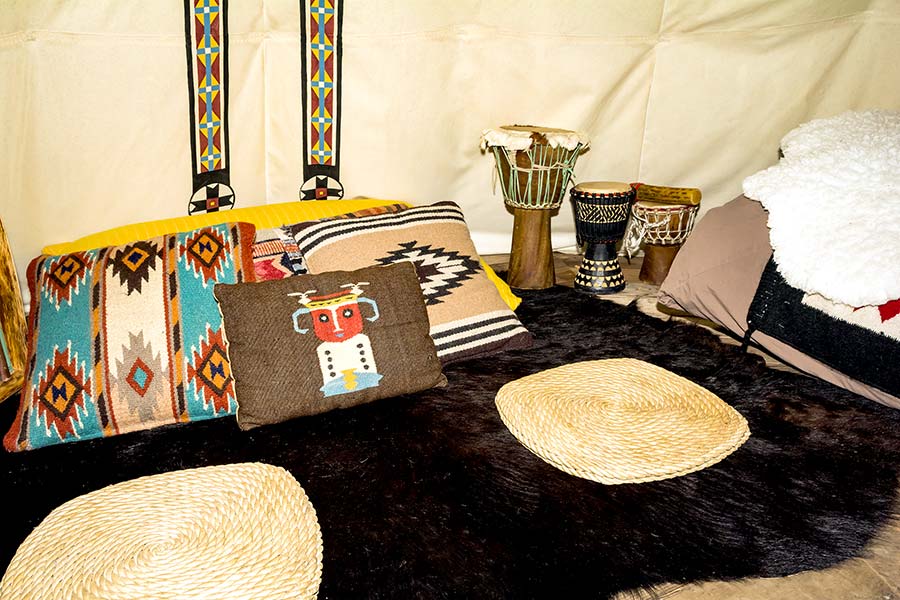 Inside a luxurious glamping teepee