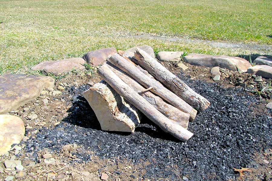 Lean-to method of building a campfire