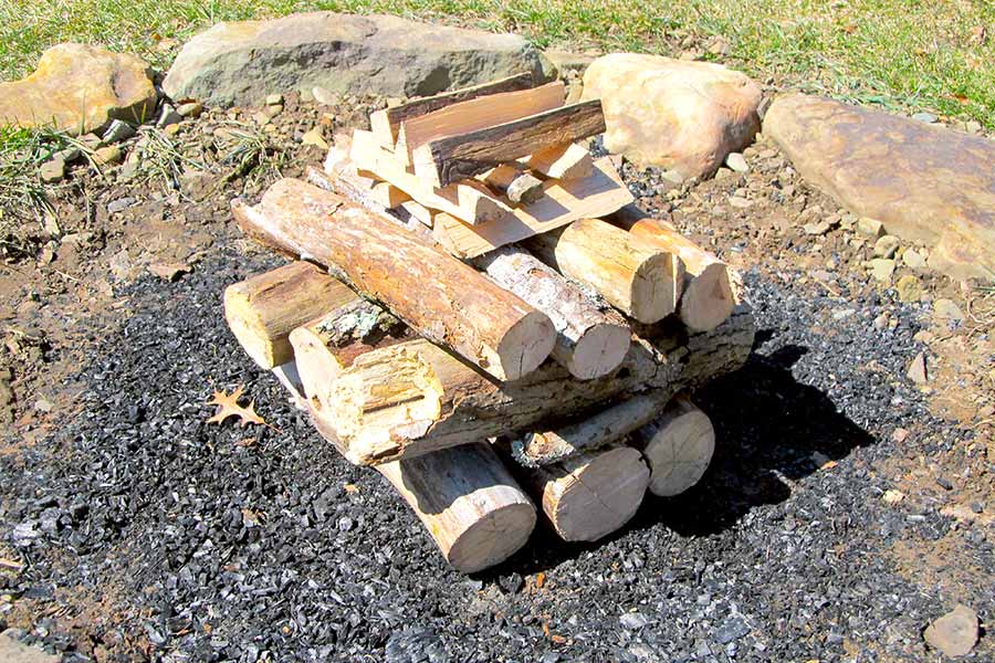 Pyramid method of building a campfire