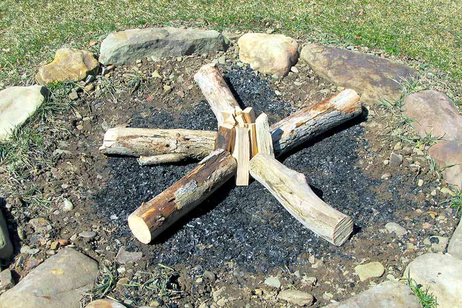 Star method of building a campfire