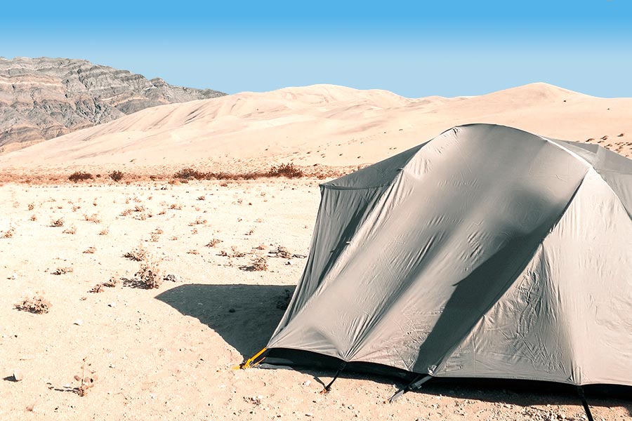 Tent pitched on the sand in Death Valley, California