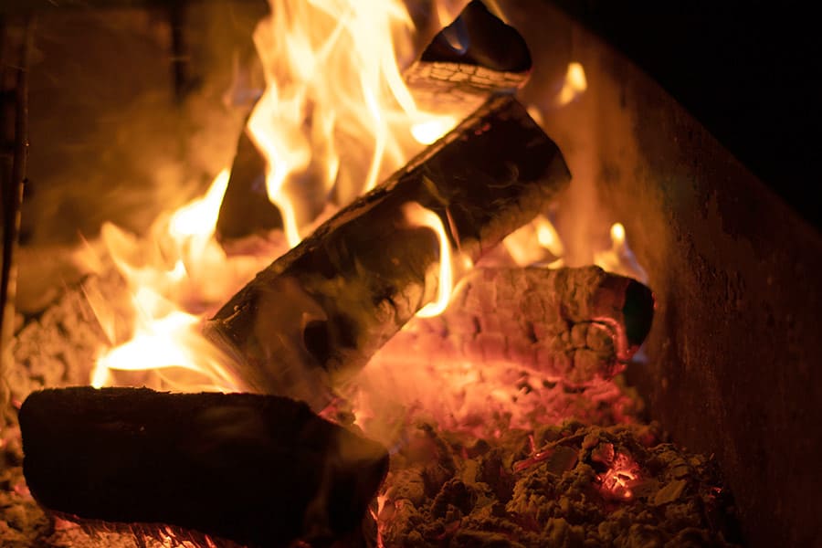 Wood burning in campfire at night