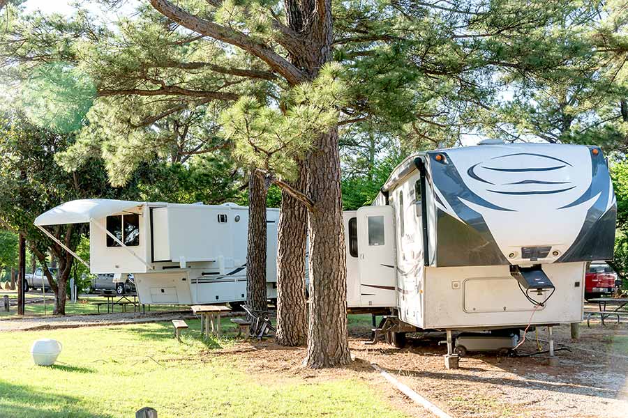 Fifth wheel camper trailers parked at campground