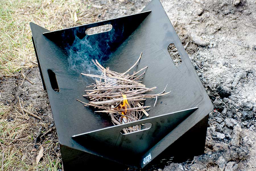 Starting fire in portable fire pit